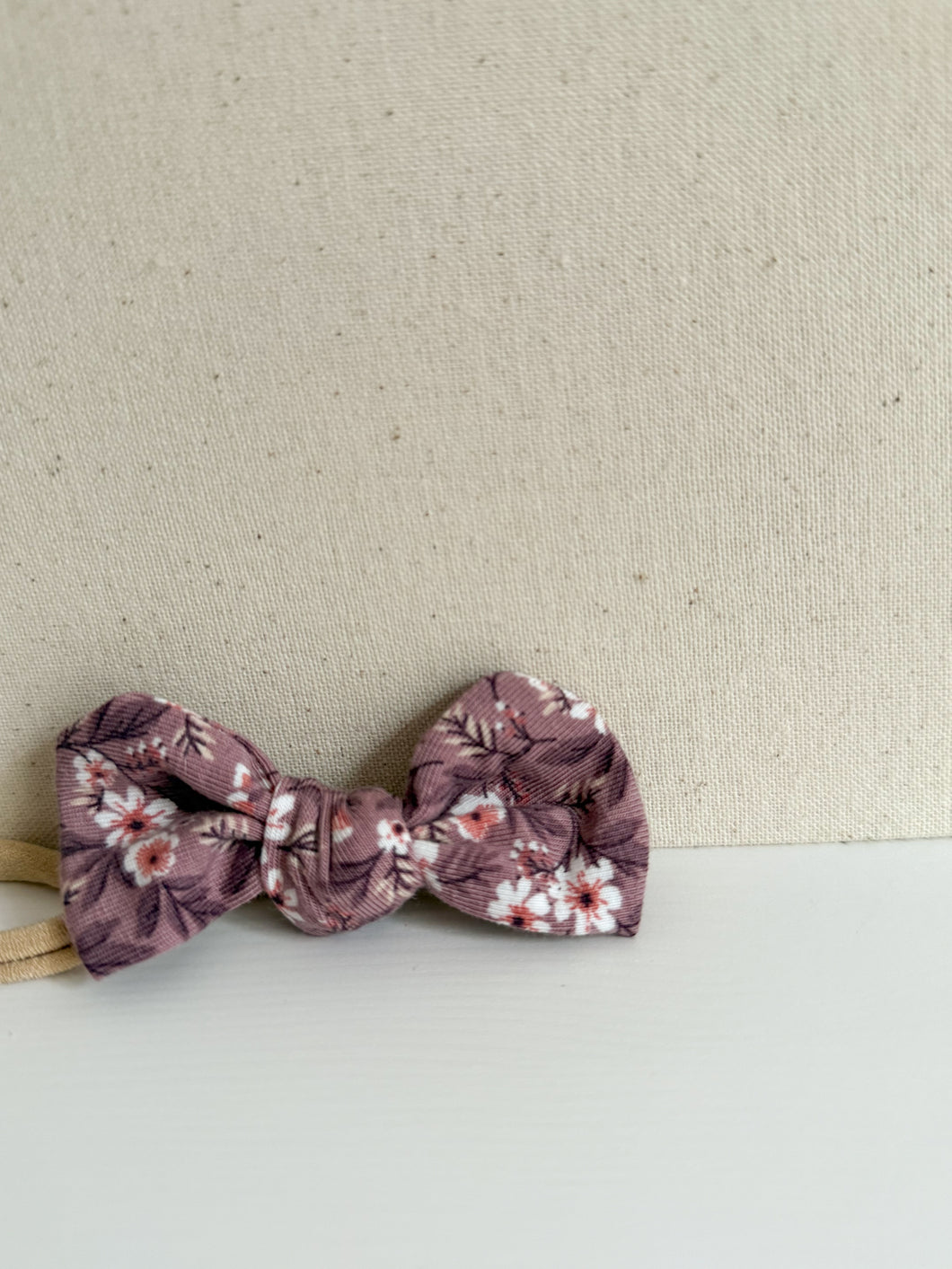 Purple floral baby bow